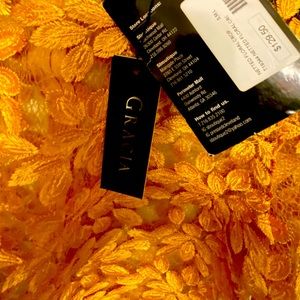 A gold lace crop top